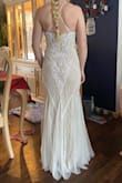 I decided to order a size down and went with an xs and I'm so glad I did, it fits perfectly! This dress is so beautiful and looks way more expensive than it is!! Highly highly recommend! - Veronica B.