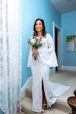 I tried on several dresses for my small COVID wedding in December, and this dress exceeded my expectations. The sleeves make it feel more casual, but the lace detail and short train are pretty and elegant. I bounce between S and M with Lulus, but after reading the reviews I decided to order a small. It fit so well right out of the bag and hugged my curves just enough. I had it hemmed and the lining sewed in. It is of high quality and very comfortable, and I highly recommend this dress!! - Kelly T.