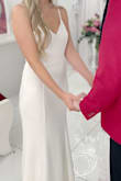 I wore this dress for my small wedding elopement. The design is beautiful! The dress fit well, but was not the most flattering. The material is heavy but somewhat thinner than I expected. If you are wanting to wear any undergarments AT ALL (including Spanx) you will be able to see it through the dress. The fabric doesn't hide any unwanted lines, so if you're wanting something more forgiving this may not be the right fit. - Allison C.