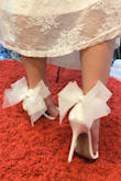 I wore these shoes in my wedding, they are the cutest, fanciest shoes ever! I was standing for like 2 hours and it was fine. But I don't think I would wear them longer. - ELVIA O.