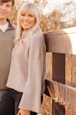 This sweater is a classic staple piece. It's so soft and warm but not too warm. It's sleeves are beautiful and I love the turtle neck. Also true to size. - Maddie B.