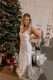 We got engaged and planned a wedding all within a month so i was very short with time with finding a dress. I never order online because i am OCD and have to see what it looks like first. I was very scared of ordering my wedding dress from lulus but i have heard nothing but good stuff so i took the chance! And it was absolutely PERFECT. Fit like a glove ! I only had to get it hemmed due to me being so short but it was everything i dreamed of and more. It was a Christmas themed wedding and a little chilly so i went ahead and added a faux shawl ;) I felt like a true princess! Thank you lulus! - Lori C.