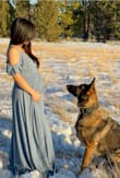 I got this dress for maternity photos but since it's a wrap dress I'm excited I can use it after I have the baby. It tightens/loosens to your comfort. I wore it with boots that have a heel and it fit perfectly. - Kristel D.