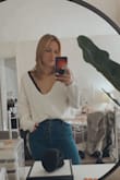 I've been looking for a sweater like this! low cut, flowy, not too long or too cropped. i want it in every color! Perfect with high waisted jeans abs a cute bralette. - Leah F.