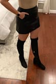 This is super cute. The pockets and the vegan leather are huge plus, but I'm very boxy framed. My waist and hips are not far from each other so for my Large to even fit I kind of have to hike it up a little higher making it a tad short. I'm 5'10" but I'll be keeping as I'm feeling positive of losing a few pounds and making it perfect. Just beware that a Large just doesn't feel Large around the band but maybe more around the mid point. - Bridgette D.