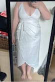 I bought this dress for my beach elopement and it was JUST what I was looking for!! I'm sort of between sizes so I purchased the L and XL, but the L was perfect and so flattering, even without spanx!  I didn't want to have to alter a maxi dress so the high-low midi is the perfect length for us shorter gals, and I love that Its not see through. The adjustable straps are great and the dress is super supportive without a bra (although you may need petals for some coverage). I'm so happy with this purchase!! - Kaitlynn H.