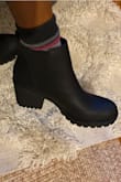 I nice chunky Chelsea heel that looks compact and not clunky on me! 
I have narrow feet and an extremely small ankle size and these are nice and snug with just enough room! They are also super comfy - Stephany D.