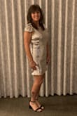 The dress is stunning, I'm a size 8-10 so I ordered a large & it fit very nicely & not tight at all but yet body forming. There's a liner underneath which helps as it's total sequins on the outside, but would be nice if liner was a little thicker as the only issue is the sequins do poke a bit at your thighs so I had to shift around some while sitting, but it wasn't bad & was still comfortable enough to sit for longer periods of time. The dress is short so be conscious if you're very tall. I loved it tho, wore on New Years Eve and I was proposed to at midnight! - Autumn A.