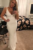 This dress is very beautiful and classy. It is also very comfortable and made me bust look great with no bra. Definitely would recommend. - Johanna V.