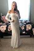 This dress is so pretty, but the arms are very restricting.  I sent it back because I couldn't raise my arms, and it was way too tight across my bottom. - Johanna V.