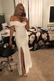This dress is so beautiful.  It does restrict your arm movement due to the off the shoulder sleeve, but if you don't have to move too much, it's just simply beautiful. - Johanna V.