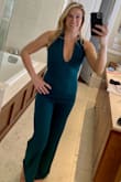 This jumpsuit was so comfortable and I received many compliments. It's not too low cut but flattering and the cross, open back it's classy yet sexy. I am tall and busty so the links and top were important in the fit was great! - Cali W.