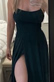 This dress fits very well, with the exception of the length. I'm 5'1 and will definitely have to get it hemmed as you can see from the pictures. It is also made for smaller busted women, there is more side boob than I'd like but my friend said we can tape them together to get rid of the side boob. It really is that pretty that I'm willing to make it work. The green is a beautiful deep color too. - Ty G.