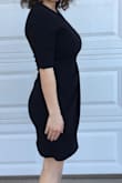 I got a medium so it would not be too tight. The material is a little stretchy and thick which makes it forgiving and flattering. The dress ends about two inches above my knees. I could wear this dress to church, work, or on a date. It's the perfect black dress! - Ricki C.