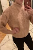 Cute sweater, soft material, and pretty color! Love it except for the neck. Unless you fold it down, it comes up very high and is awkward. - Julia S.