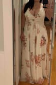 Oh this dress is gorgeous. Simply stunning. Elegant, and flows. Makes me feel like a goddess. I fully intend on wearing it for my wedding. I wanted something out of the box, but can still read bride without screaming BRIDE. My only wish is that I had read the reviews a little deep - wayyy in the back where the ladies with the racks had written in. Here I was worried about screaming 'bride' with my dress.  Right now it screams "BOOBIES"  I feel I should have gone up a size just so there was extra material so a seamstress can work her magic. I'm not sure how I'm going to do this now, as I am outside the window of returns. In the picture the little tiny dot on the front can be seen. That's the snap that is supposed to hold that dress together. Hahahaha yea, no. But my word what a gorgeous, well made dress! I will make this work!!! Because I love it! - Keely H.