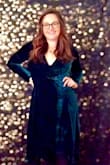 I bought this dress for New Years and it was perfect! Super comfortable. I was debating between a M & L, it was slightly big but didn't look too baggy. - Mackenzie D.