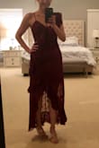 Really pretty fabric that looks exactly as pictured. I usually wear a size 4, and this fit like a glove. It was slightly too tight on the chest with a bra, but fit without one and was snug enough to act somewhat like underwire and keep the tata's looking perky. - Nicole K.