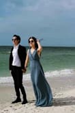 Love this dress. The greyish blue color worked out great for beach photos. The style is very elegant. The downside for me is that the shoulder straps are a bit too long and I had to pin them together at the chest area to avoid slipping off. Overall very happy with the purchase. - Zixuan W.