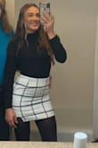 Fits great, even with a bigger bum. Very comfortable and didn't ride up. Paired it with with a plain black long sleeve, stockings, boots, and a leather jacket. Very cute! - Alexis S.