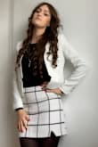 The skirt is true to size. It's a great business look with black tights a black dress and a white blazer. I love wearing it with my high knees boots. The material is very comfortable and the skirt doesn't go up and down when walking. - Melisa