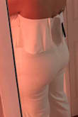 I love this jumpsuit! It's very flattering but definitely comes long. I'd say I'm average height 5'5, but have a big booty and it looks great! I want to order other colors. - Allison J.