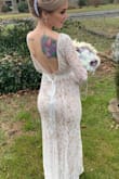 After changing our wedding plans three times, I bought 3 different dresses. My original dress from David's was $500, didn't end up wearing it due to time constraints for alterations. I found this dress and fell in love. It's always nerve wracking to order online, but sometimes ya just gotta go for it and hope for the best! It's a great dress, I love that it has a nude underlay, because of that, I was able to wear thermal leggings underneath and you couldn't tell! I'm short so had to get about 4ish inches taken off the length. I wore stick on boobs underneath and it didnt make the dress too tight on the top. This dress is so beautiful, I am petite but carry most of my weight in my hips,butt and thighs, and it was the perfect fit! Hugged my curves beautifully and elegantly. I did notice after having it shortened, there were some strings hanging from the bottom, but that could be the tailor and not because of the dress itself. Overall, 100% would recommend! - Nicole D.