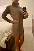 I ordered a size down, XS, based on reviews, glad I did. I'm surprised how soft and nice the material is. It fits great, not too long it too short, see photos to see where the hem stops, I'm just barley under 5ft 7in. Will be sooo cute with tall boots or even ankle booties. Don't wear any bright colored or sparkly undergarments, as there's a little space between the knit stitching. I was wearing panties with thick rhinestone waist and could see a tiny bit of sparkle showing through. All in all I love it!!! But definitely order a size down. - Hannah A.