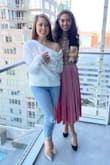 This sweater went perfectly with jeans and stilettos for a daytime visit to the city. It can be worn off-shoulder or on both shoulders. I ordered it in both colors! - Holly H.