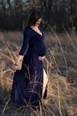 I was worried about buying a regular dress for maternity, but it worked out perfectly! The tie was right above my bump and the dress material is very comfy!! Hopefully I can wear it after maternity! I just sized up to a L from my normal size medium. - Michele V.