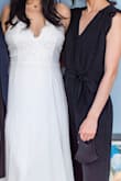I should've bought a small but overall the dress was light and comfortable! I should have hemmed this but I got pregnant and just didn't have the time and energy to get it hemmed so just dealt with it. But it was perfect for my small informal ceremony. I hope to wear this again once the pandemic is over and it's safe to have a large wedding again! - Grace L.