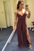 Hi! So I know the model is 5'8 and I'm only 5'3 so it was soo long on me even with heels. I had to take it to get hemmed and put cups into it because it would look weird with a bra and I do not like those sticky cup bras. I still can't wait to rock it to my championship dirt bike banquet next week! - Samantha B.