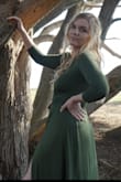 LOVE THE COLOR! I love it! Very beautiful. I would recommend not wearing anything that will show lines under or creates muffin tops or arm things haha you know what I mean. This dress shows it all but it soooo cute! - Kat P.
