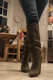 I absolutely love the style and color and the way they look with outfits. BUT... getting them on is a bit of a nightmare. Theres no zipper or anything so you're supposed to just slip them on and my feet were really struggling to get them on (I had a little slip sock on and jeans). Once they're on though, they fit perfect. If I were to size up, they might be too big, then again maybe my ankle would slide in more easily. - Sonya C.