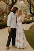 I agree with all the reviews I read before purchasing this. It's AMAZING. Its a wrap dress so you pull a string through a hole to close it up which makes the fit more custom. I did have to get it hemmed for length (I'm 5'4" and was wearing heels). I wore it for my engagement photos and it was perfect. - Brittany W.