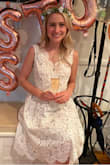 Very much what is pictured and perfect for a bridal shower. I should have worn padding through because I was swimming in the chest area. I have to be cognizant to stand tall with my shoulders back otherwise the boob area kind of sagged in. If you're small chested, maybe go with the XXS (if available). - Brittany W.