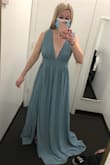 I really liked the look of the dress online, but it definitely runs a size larger than your normal size. I am typically a S, but the S was way too large. Unfortunately, I had to stick with the size because the XS wouldn't be in stock for another month and a half and I needed this dress by the end of the month to stand in a wedding. I had to get the dress massively tailored (which cost more than the dress sadly). I also thought the dress was a few shades darker in person than online. - Lizzy R.