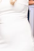 I wore this for my wedding reception dress so I didn't have to ruin my beautiful wedding gown. It's very tight around the tummy and you really can't wear spanx. I even wore the nude underwear and you still kinda show. I probably should of just went commando. - Theresa L.