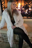 Fits perfect and true to size. Keeps you very warm but doesn't stay closed when buttoned. - Jenna M.
