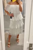 I am normally a size small and decided to size down to an xs based on the other reviews. It fits perfect and I can wait to wear it for my wedding shower! - Carley B.