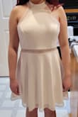This dress fits true to size and feels so comfortable to wear. The material is a bit thicker than expected (a plus) with a nice underlayer and is super soft. There is no chance of undergarments showing through and the white is as pristine and bright as the picture! The skirt flows beautifully which I specifically wanted to the dance I needed this dress for. Overall, A+ would buy. - Ashley W.