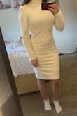This dress screams elegance. From the pearls, puffed sleeves, and ribbed texture I was sold. A thick warm dress for winter. Size up from your usual size because it does run small. Went with the medium and fits great. - Kendra T.