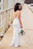 I took the chance on this dress for my elopement...and no regrets...dress came on time and it was simple yet elegant just what I wanted. I'm petite so I had to get the back and length altered other than that it looks like a $1200 dress from David's Bridal or any other expensive bridal store. If you're eyeing this dress don't second guess it...BUY IT!!! - Lorena L.