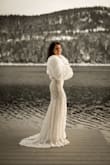 This dress was PERFECT for our surprise winter elopement. I paired it with a white fur coat and couldn't have loved it more! It was lightweight, stretchy, and was very easy to move in. It was so comfortable, I could have kept it on all weekend. I read a TON of reviews and still was unsure, so I ordered an extra small, small, and medium. I normally wear a medium in these kinds of things and I was able to comfortably size down to a small and the dress was so flattering. I received so many compliments. - Katie H.