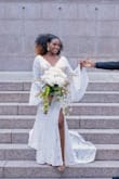 Due to the pandemic our wedding was rescheduled multiple times, so we settled for a civil wedding. This dress came in perfect. The fit was perfect, very well made for cost, and quality material. Made me feel absolutely beautiful on my day despite the times. - Paulene L.