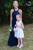 The dress was heavier than expected. Super long but overall, I loved it! I had it altered a little in my chest area in the pic because there is quite enough room for a busty lady. - Sara B.