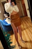I am in love with this skirt, it fits a little bigger than I would have liked, but I have a smaller waist (big hips) so it rides up a bit. I don't think I would change the size though. Material is great and the slit isn't too revealing. - Brittany H.