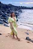 I am pretty curvy and wasn't sure if I should get the small or medium. I ended up ordering both but kept the small because the material felt like it'd stretch out a bit. I wear a size 6 and usually a medium. This dress fit so well. The top had enough coverage so I wasn't falling out. Highly recommend this dress. - Molly T.