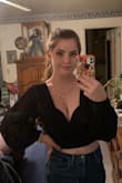 I bought this to wear on my 21st birthday and it was so beautiful and so flattering. It doesn't have much support for the girls, so I had to get a sticky push up bra, but it worked fine. I would definitely size down as it is a little big, but you can adjust with the tie in the back. - Laura M.