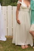 I ordered this for my backyard themed wedding. I added lace around the bust because I felt like it was very low cut and I have large breasts for my size. Overall, I love the dress! I recommend adding lace if you're trying to go for a more conservative look. - Gina S.